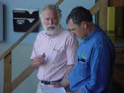 John Fancy and Gary Brooks reviewing the day's agenda.